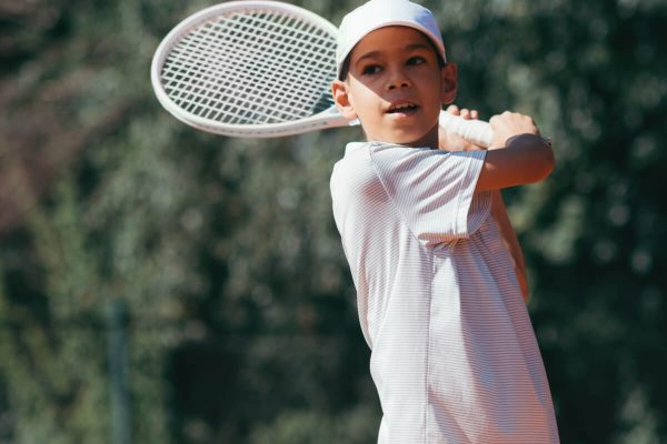 tennis-instructor-with-boy-in-tennis-lesson-2021-08-26-16-54-04-utc.jpg